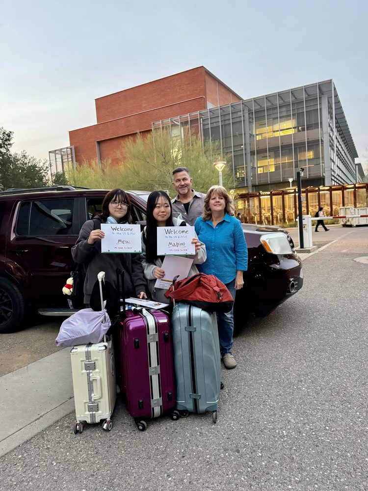 Host couple welcoming students Mew and Mahiro at ASU campus